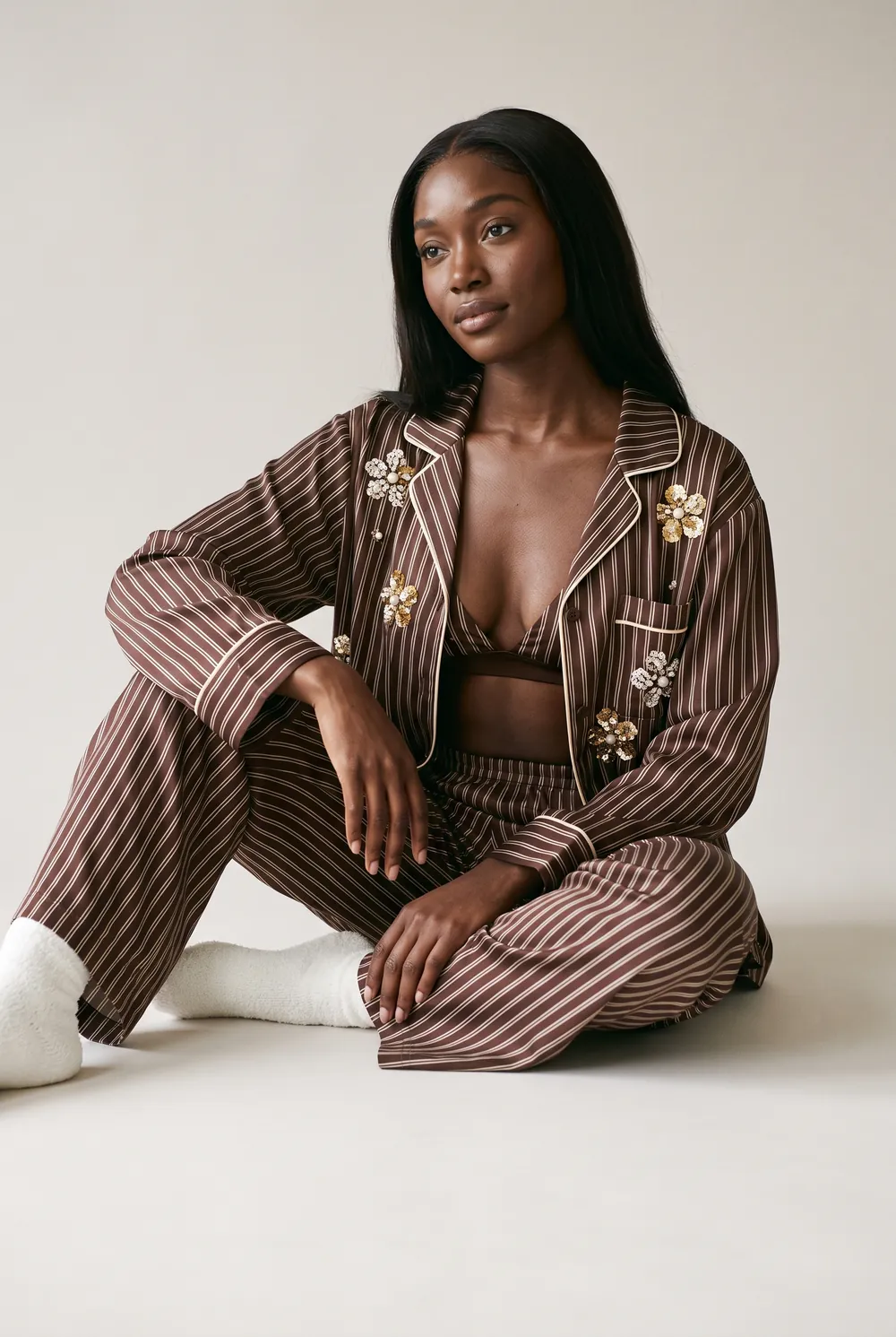 always cosy: cocoa pinstripe set on a studio floor